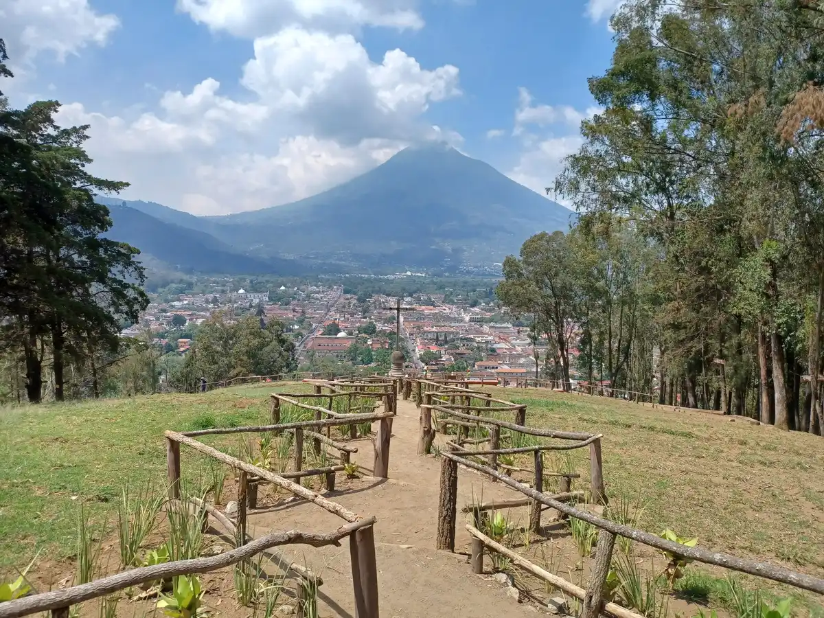 View over colonial Antigua and Volcán de Agua from Cerro de la Cruz, a stop on many coffee tours in Antigua Guatemala